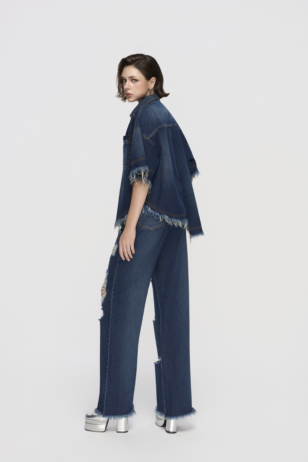 Quần Jeans Nữ Ống Rộng Gấu Tua Rua Xanh Chàm Đậm
